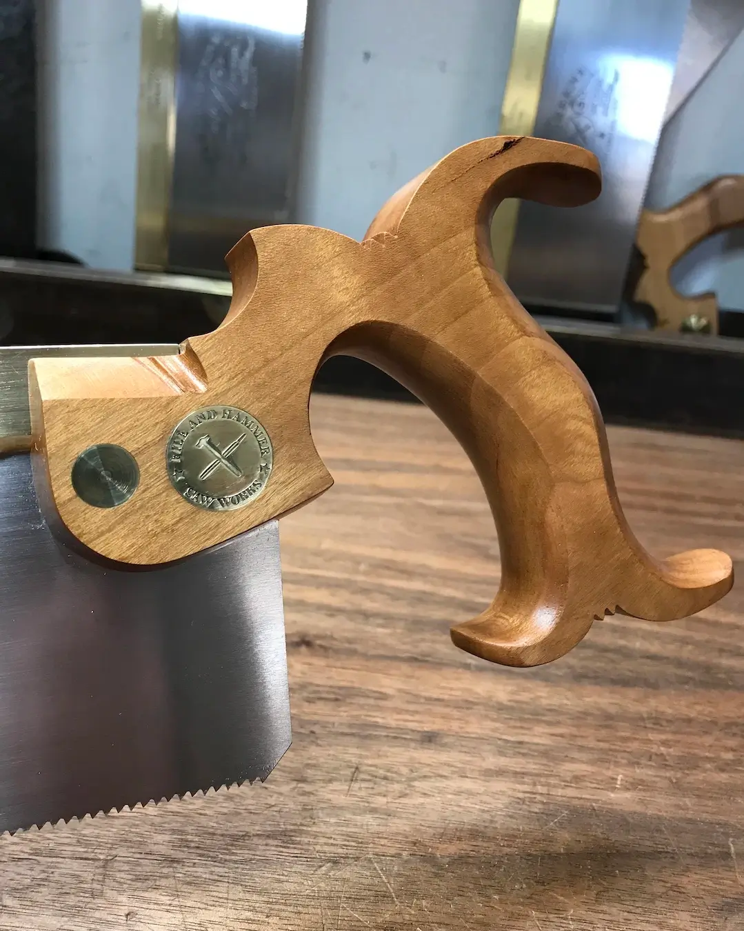 My standard open handle in cherry wood.