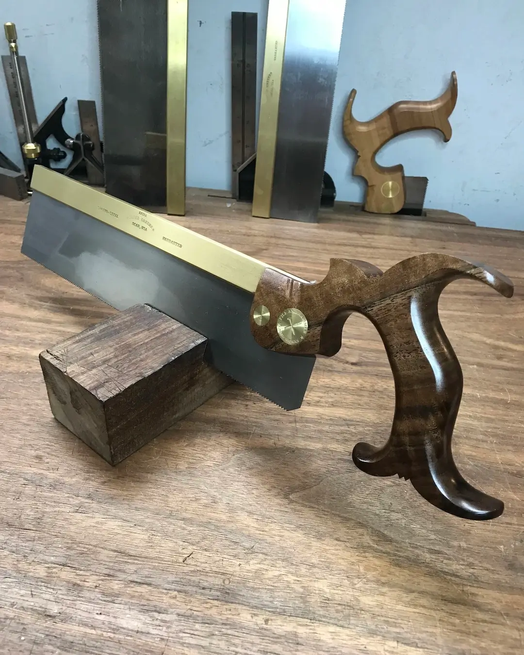 A twelve inch dovetail saw with my standard handle in walnut.