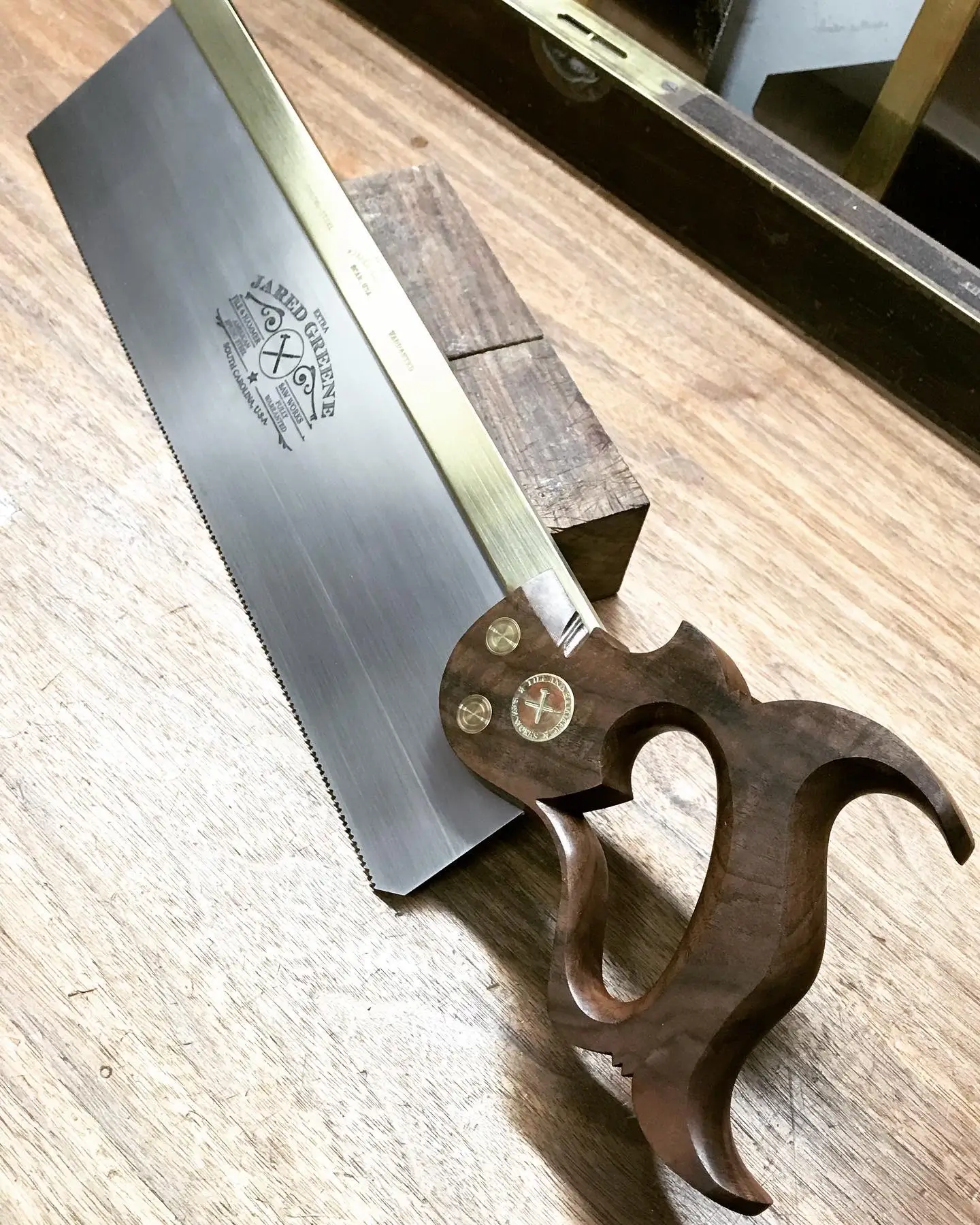 A 14 inch sash saw with my standard handle in walnut.